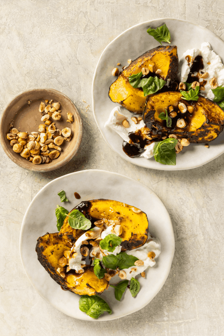 A stunning fall recipe: caramelized squash, balsamic agrodolce, burrata, and crunchy hazelnuts. Perfect for Thanksgiving or holiday entertaining.