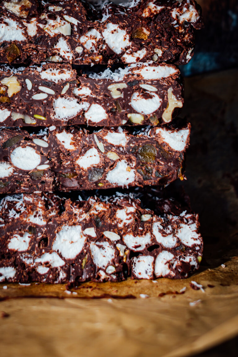 No-bake rocky road bars made with dark chocolate, marshmallows, walnuts, pepitas, and dried fruit