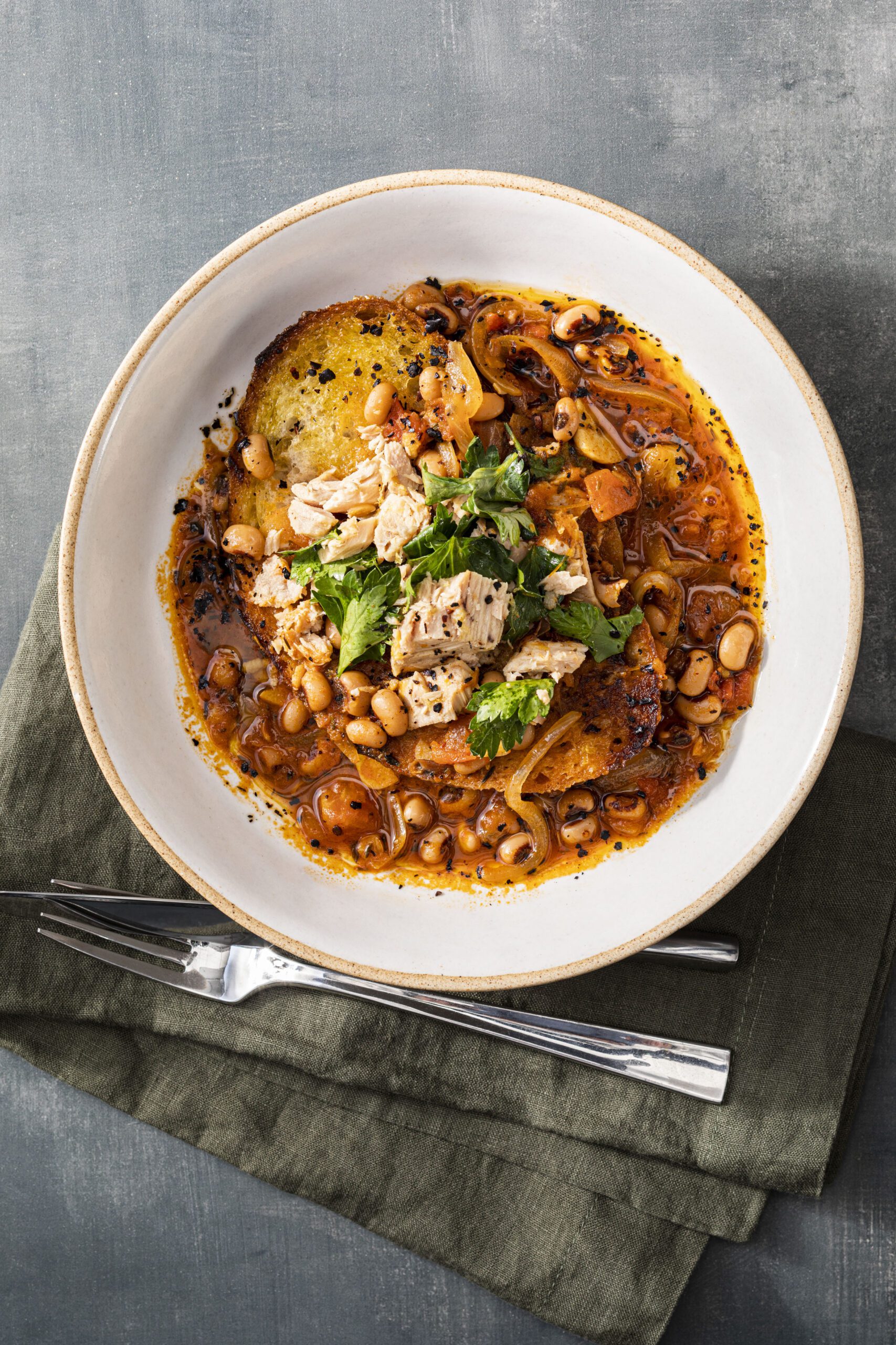 Pantry dinner with black-eyed peas served with tuna toast and olive oil