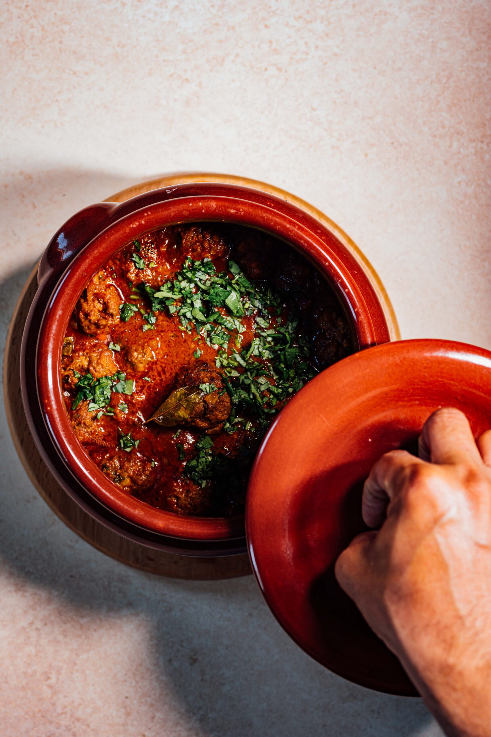 Goan meatballs in tomato curry with cilantro
